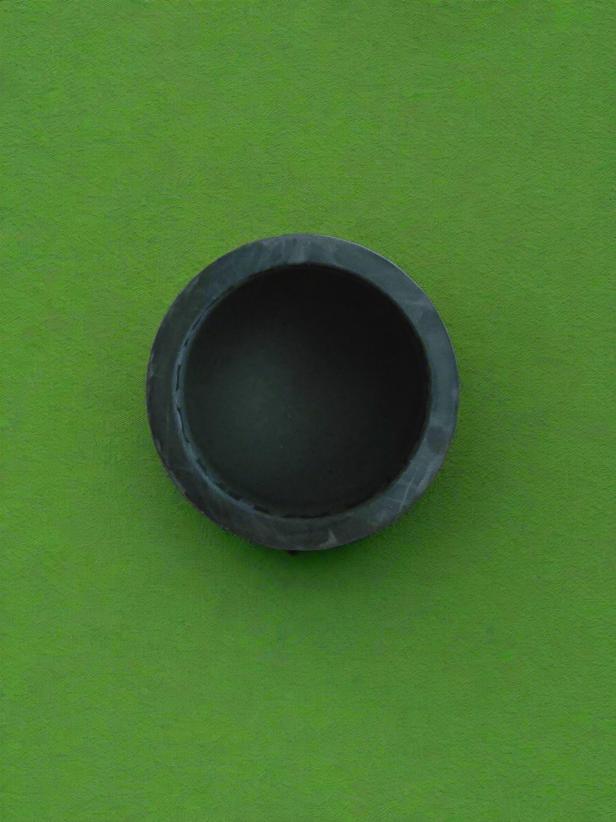 A black rubber golf ball pickup retriever
